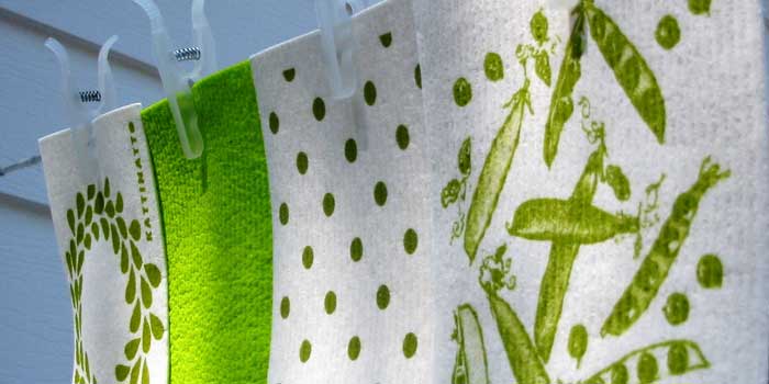 Finnish sponge dishcloths in green motifs