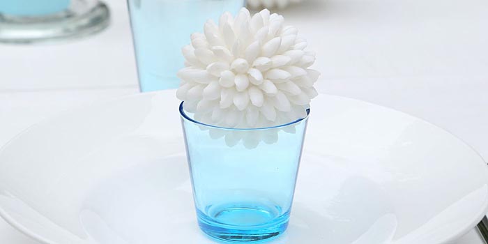 blue -green glass with white ball